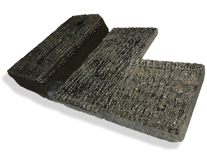 Natural lava stone floor and wall, rugged texture, durable for both indoor and outdoor living spaces.