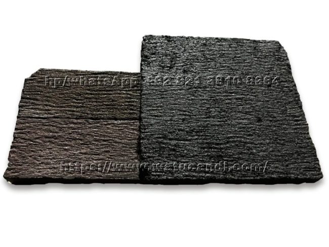 Authentic Indonesian lava temple stone pavers by Watucandi, featuring a handcrafted machine-chiseled etched surface with unique irregular line texture, natural volcanic stone color, perfect for pathways, patios, and outdoor landscaping.