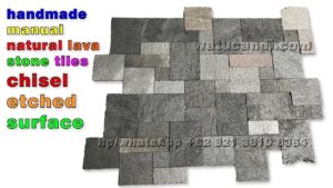 Permukaan batu alam lahar buatan tangan dengan tekstur vulkanik alami, ideal untuk pelapis dinding dan lantai bergaya rustic dan modern