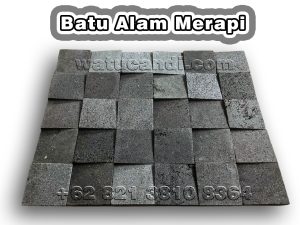 Random installation pattern of Merapi 3D natural stone slabs with uneven thickness, creating a dramatic shadow effect on an artistic wall. Merapi volcanic stone random thick one-side 3D pattern – 3D textured wall tiles with uneven thickness