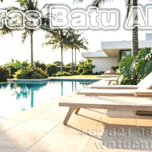 Beige sandstone and limestone wall and flooring tiles for tropical swimming pools from Indonesia featuring warm creamy tones and natural texture ideal for pool surrounds and water features