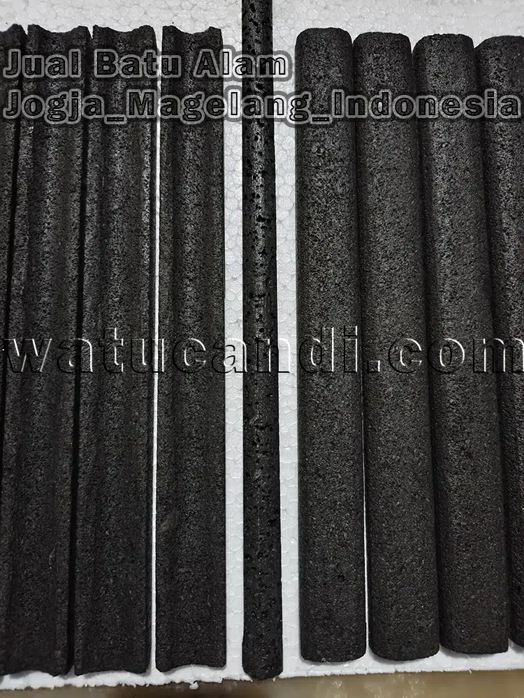 Bamboo groove candi stone with curved and round profiles as minimalist industrial tropical wall cladding decoration
